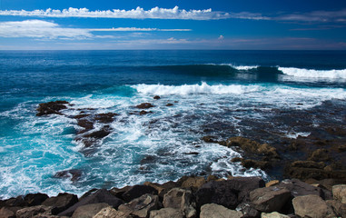 Waves by the rocky shore