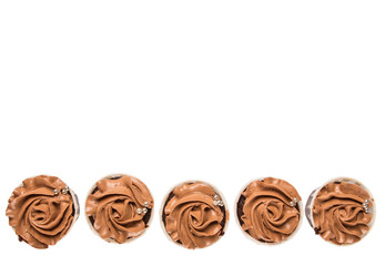 Moist chocolate cupcake over white background