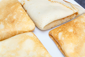 Sweet pancake on white plate