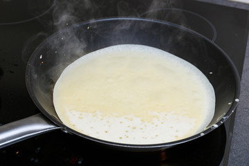 pancakes frying in the pan