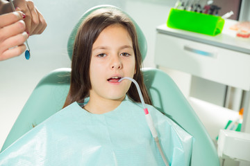 little girl patient to the dentist