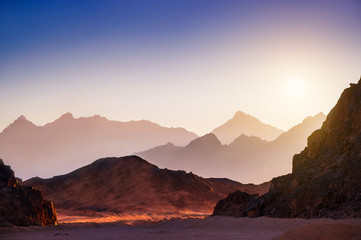 Fantastic landscape with mountains at sunset
