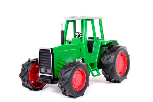 green toy farm tractor