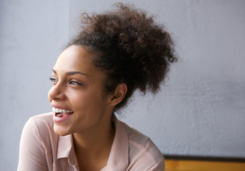 Beautiful young african american woman laughing