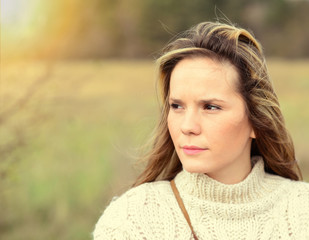 Portrait of beautiful woman at sunset