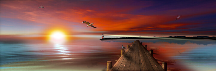 Panele Szklane Podświetlane  Zachód słońca na lądowisku z latarnią morską i mewami