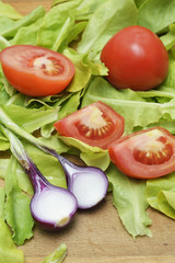 Fresh green salad with tomato and onion