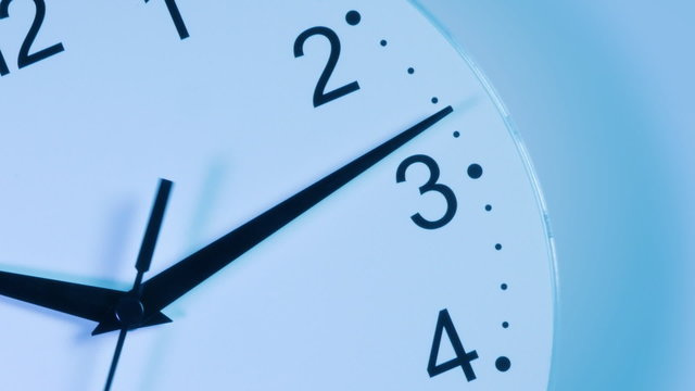 Clocks time-lapse with  black Arabic numerals. Zoom