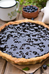 Blueberry pie, milk and fresh berries