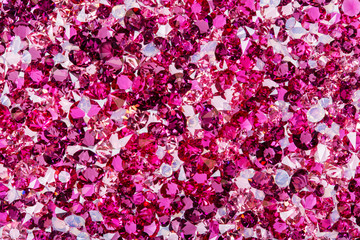 Many small ruby and diamond stones, luxury background © Dmytro Synelnychenko