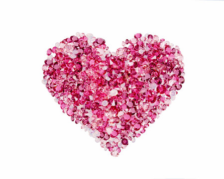 Red heart made of precious stones on white background