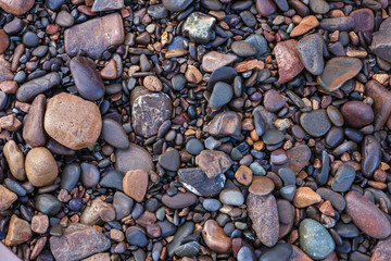 texture of wet shiny small sea stones