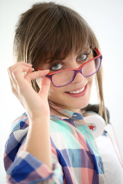 Modern young girl with eyeglasses on