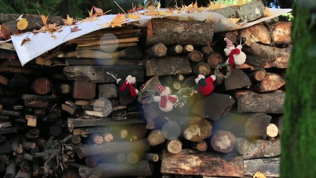 Christmas decoration on a pile of logs