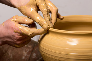 potter, creating an earthen jar