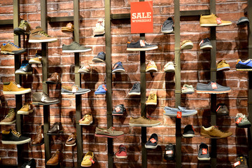 Sale in shop of men's shoes. Poland