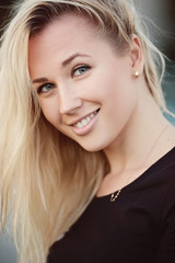 Fototapeta premium beautiful blonde girl portrait on the street