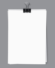 Blank sheets fastened by a binder clip
