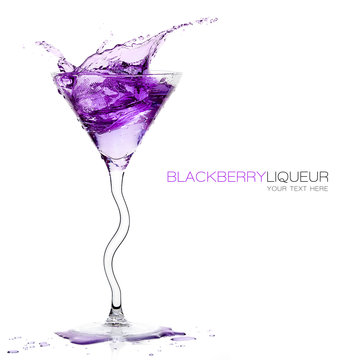 Stemmed Cocktail Glass with Blackberry Liquor Splashing. Templat