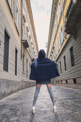 Beautiful girl posing in the city streets