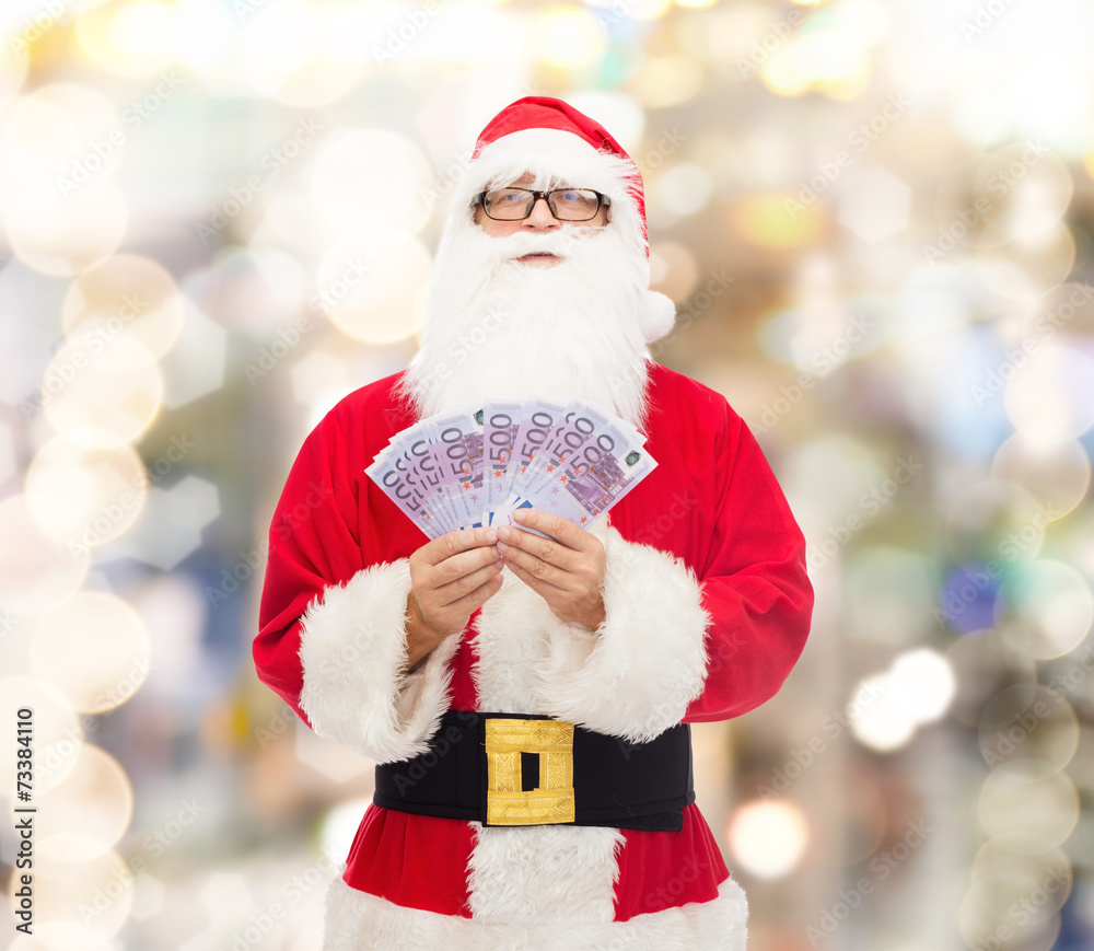 Canvas Prints man in costume of santa claus with euro money