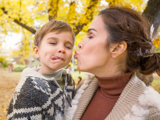 Mother and son making faces