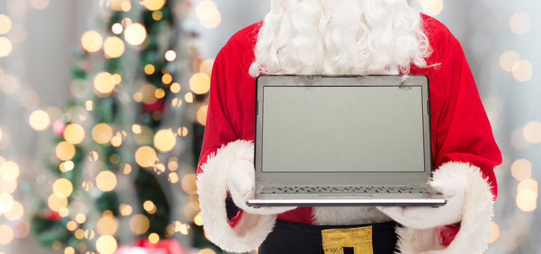 Close Up Of Santa Claus With Laptop