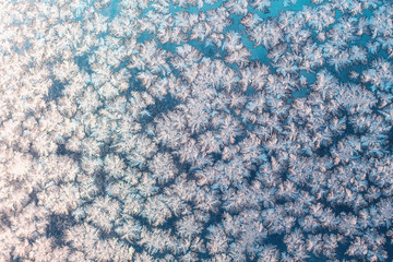 Snowflakes on frozen window