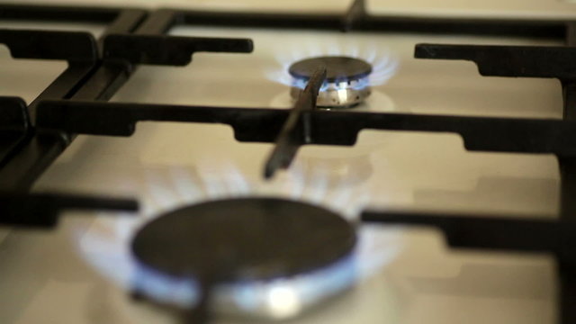 fire burning on a gas stove