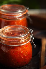 Jar of home made classic spicy Tomato salsa
