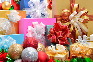 Fototapeta na wymiar Pile of colorful gifts box and christmas balls
