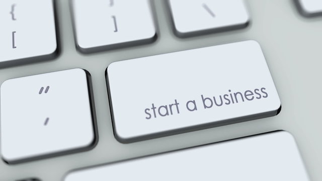 Start a business button on computer keyboard. Key is pressed