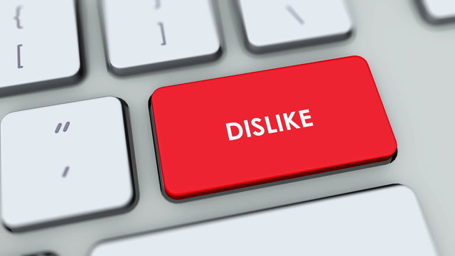 Dislike button on computer keyboard. Key is pressed