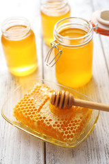 Fresh honey on wooden table