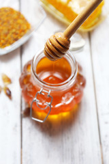 Fresh honey on wooden table