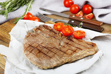 Delicious grilled meat on table