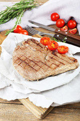 Delicious grilled meat on table