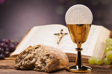 Sacred objects, bible, bread and wine. - obrazy, fototapety, plakaty