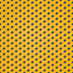 Halftone of gray dots on a yellow background