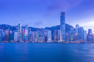 Hong Kong Victoria Harbour cityscape at night.