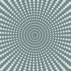 Circular halftone of gray dots on a gray background