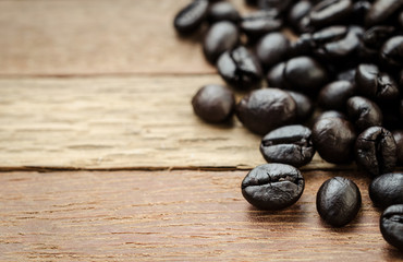 Coffee beans on wooden background