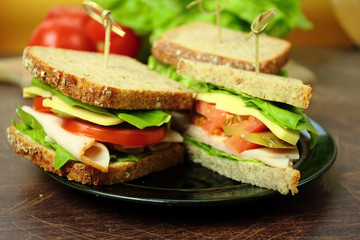 Sandwiches with ham cheese and lettuce