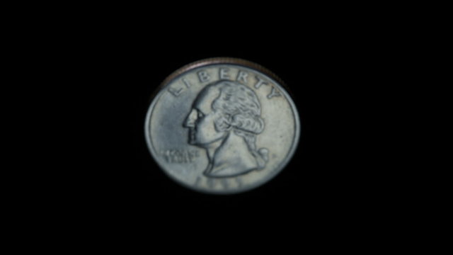 Quarter flipping in slow motion