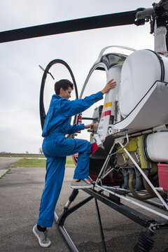 Young woman helicopter pilot.