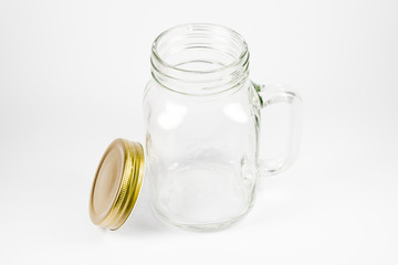 An empty clear jar with the cap