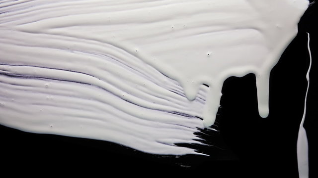 Brush paint over black background