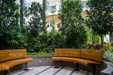 Curved Wood Benches in Garden