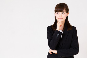 asian businesswoman thinking on white background