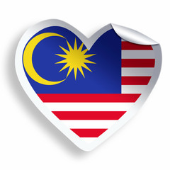 Heart sticker with flag of Malaysia isolated on white